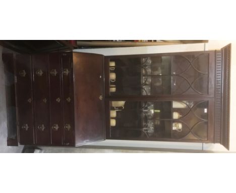 A GEORGE III MAHOGANY BUREAU BOOKCASE  with dentil frieze above astragal glazed door, the bureau base with well fitted interi