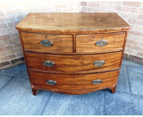 A MAHOGANY BOWFRONT CHEST OF TWO SHORT AND TWO LONG DRAWERS  on bracket feet, 98cm wide 53cm deep 83cm high