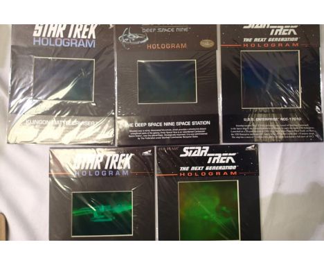 Five Star Trek holograms, as new and sealed in packets. Pack size 26 x 20 cm. P&amp;P Group 1 (£14+VAT for the first lot and 