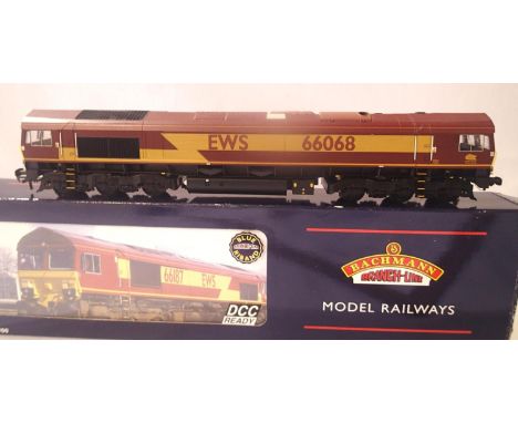 Bachmann B2-733, class 66 diesel, E.W.S livery 66068, in excellent condition, no detail pack, box with wear. P&amp;P Group 1 