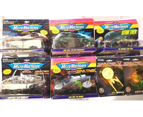 Five Micro Machines Star Trek, three vehicle sets and two ERTL vehicles. All sealed blister packs. P&amp;P Group 2 (£18+VAT f