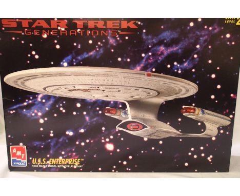 AMT plastic kit 1/650 scale VSS Enterprise appears complete, unstarted, contents unchecked. P&amp;P Group 1 (£14+VAT for the 