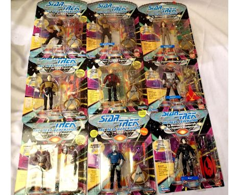 Nine Bandai Star Trek Next Generation action figurines, as new in blister packs, wear to some packs. P&amp;P Group 1 (£14+VAT