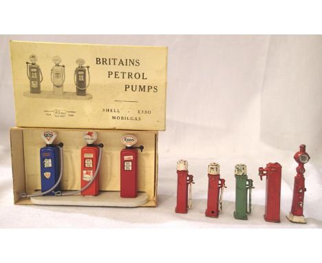 Britains petrol pumps set, 103V, Mobilgas, Fina and Esso Extra, missing one hose, in good condition, unboxed, and five other 