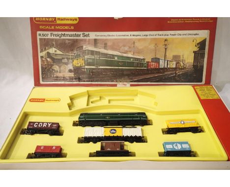 Hornby R507 Freightmaster set, AIA-AIA diesel and six wagons only. No track etc, excellent condition, box is fair - good. PP&
