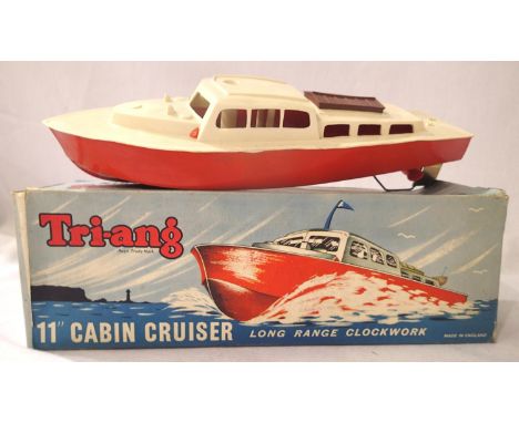Triang eleven inch cabin cruiser, clockwork (no key), plastic in very good condition, box is fair. P&amp;P Group 1 (£14+VAT f