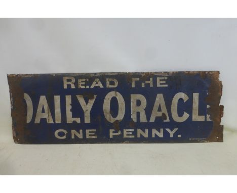 A Daily Oracle rectangular enamel sign by Patent Progress, 36 x 12".