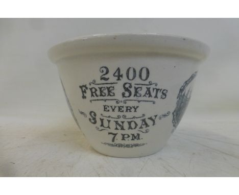 A pottery basin advertising 'The Dome, Brighton' and inside bearing the words: 'A Happy Xmas 1911'.