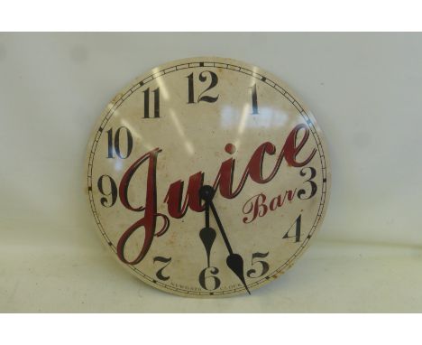 A decorative 'Juice Bar' circular convex wall clock, 20 1/2" diameter.