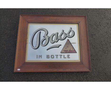 A small Bass mirror in original frame, 22 1/4 x 18 1/2".