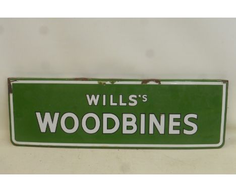 A Wills's Woodbines rectangular enamel sign, with top flange, 28 x 9".