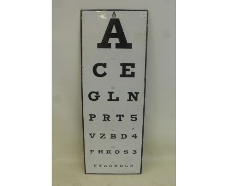 A rectangular eye test enamel sign, 8 1/4 x 22 1/2".