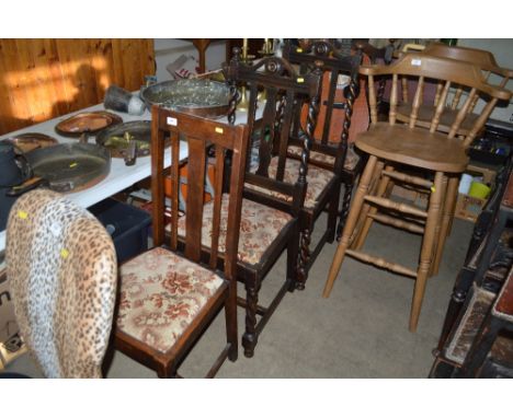 Three oak barley twist chairs together with an oak slat back chair