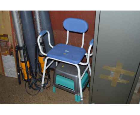 A disability chair and two stools 