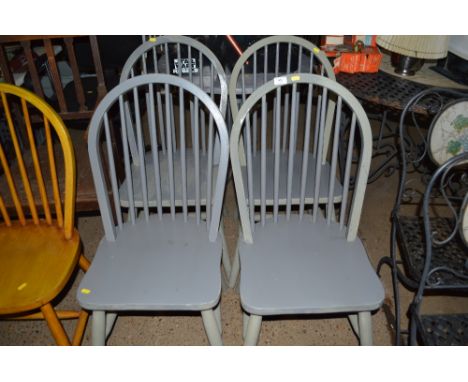 A set of four stick back grey painted dining chairs 