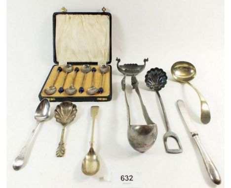 A small quantity of silver and silver plated items to include a Georgian silver spoon, a silver handled knife, a small ladle 