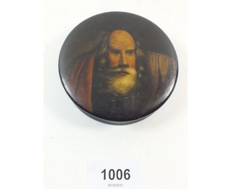 A Victorian papier mache snuff box painted portrait of a nun 