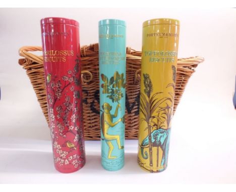 A Fortnum and Mason wicker picnic hamper basket with three Fortnum and Mason biscuit tins, 51.5 x 30.5cm 