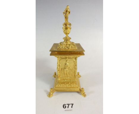 A fine cast silver gilt inkwell with classical decoration, urn form top and sphinx feet, London 1911, by Wakely &amp; Wheeler