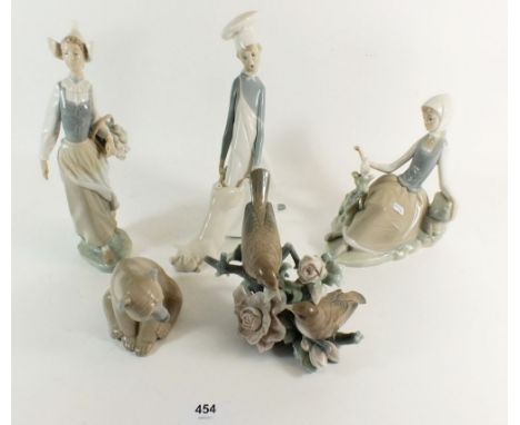 A mixed group of five Lladro figurines to include a girl sat with bird, girl with basket, birds amongst flowers etc. 