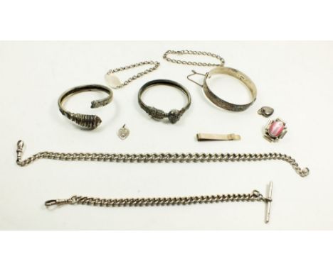 A collection of silver jewellery items to include a vintage silver hinged bangle, two antique silver fob chains together with