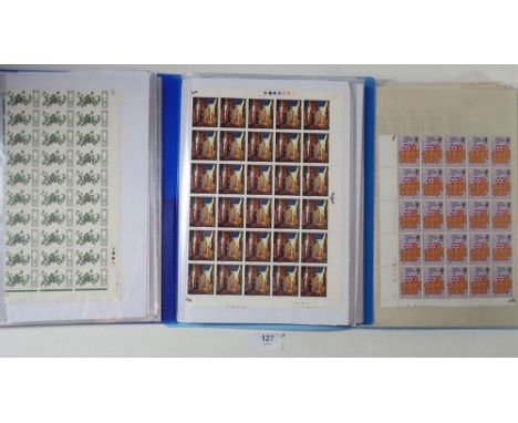 GB &amp; Br C'wealth: Three pocketed A4 folders (60 leafs total) full of UMM QEII defin and commem stamps. These incl GB pre-