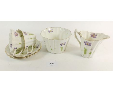 An Edwardian part tea service printed and painted violets 'Thelma' by W &amp; Sons, Longton comprising: four cups, six saucer