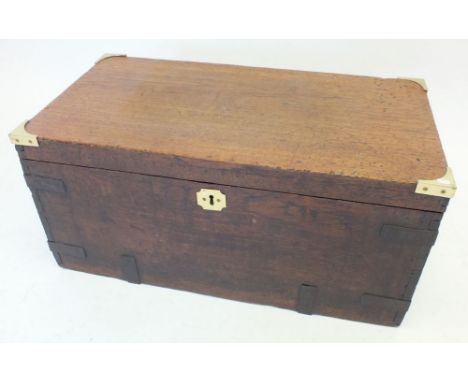 A 19th century brass bound stained oak trunk, 67 x 35 x 31cm 