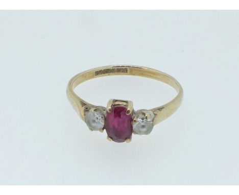 A 9 carat gold ring set ruby and white stones, size W/Z 