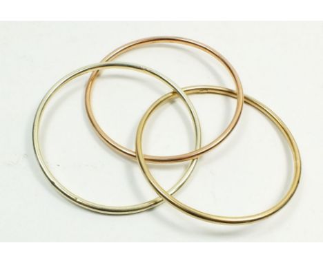 A 9 carat gold three colour triple bangle, 11g