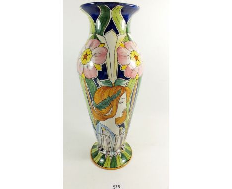 A Faience  Art Nouveau studio vase painted flowers and woman's head with flowing hair, 35cm 