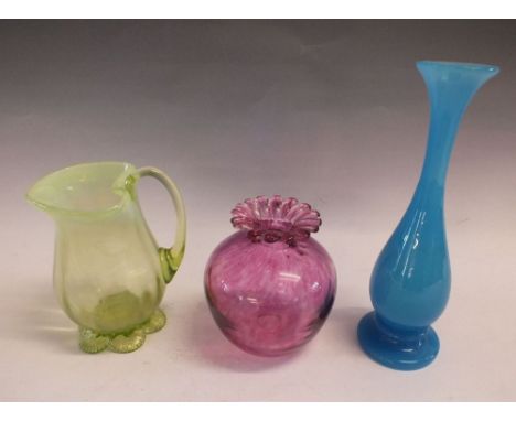 A pink glass vase 9cm, a Vaseline glass vase and a turquoise one 