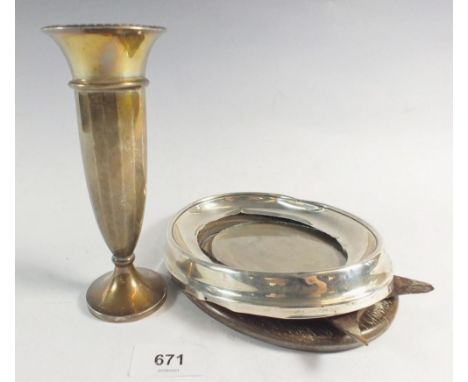 A silver vase 15.5cm and an oval silver photograph frame, 17 x 14cm 