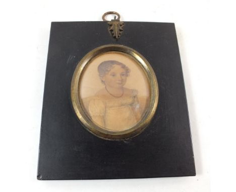 An early 19th century watercolour miniature portrait of a young girl in white dress, 6 x 5cm 