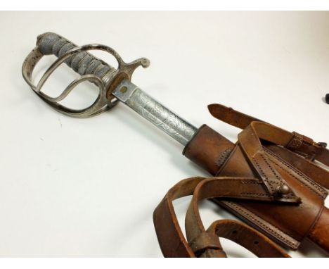 An officers dress sword for the 1st Cardigan Regiment with engraved blade, shagreen handle and leather scabbard 