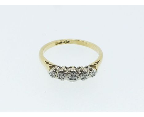 An 18ct gold illusion set diamond ring, size M, 2.5g 