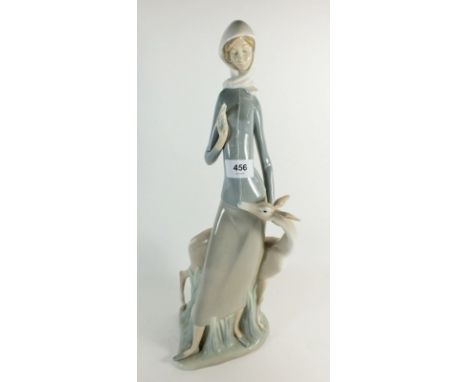 A large Lladro figure of a woman with deer, 45cm tall 