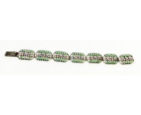A Bernard Instone silver and enamel flower bracelet, with stylised floral foliate design in shades of pink, purple, blue and 