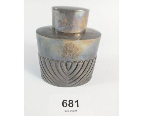 A silver small tea caddy with half gadrooned decoration, 7.5cm tall, Sheffield 1894, 62g 