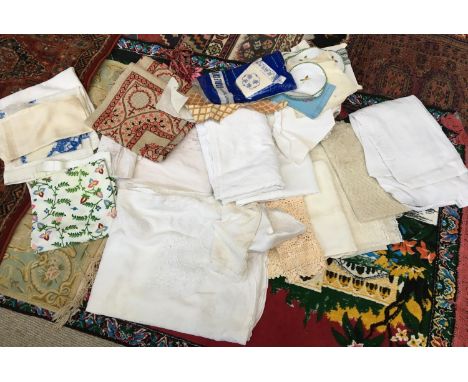 A mixed box of vintage lace, linen, tablecloths, napkins, fabric samples, etc (in wooden drawer) 