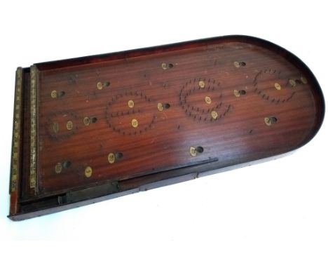 A vintage wooden Bagatelle board