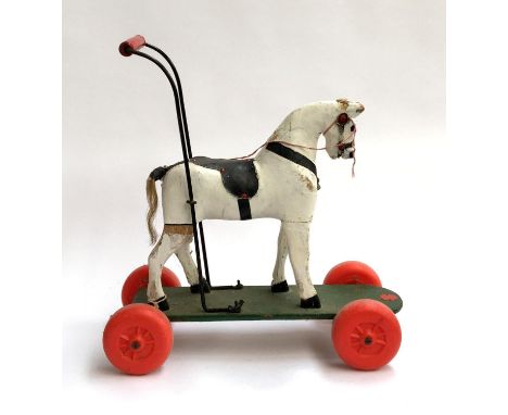 A vintage wooden push-along horse, 54.5cmH 