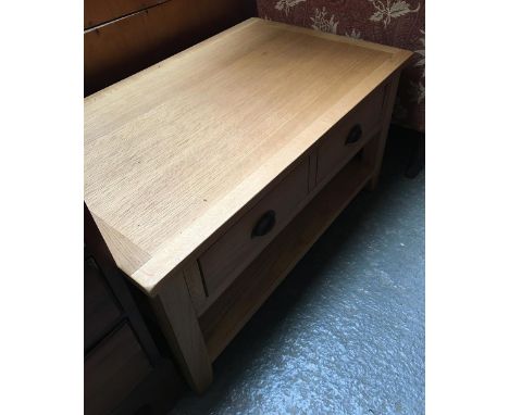 A light oak coffee table with single drawer and undershelf, 90x55x48cmH 