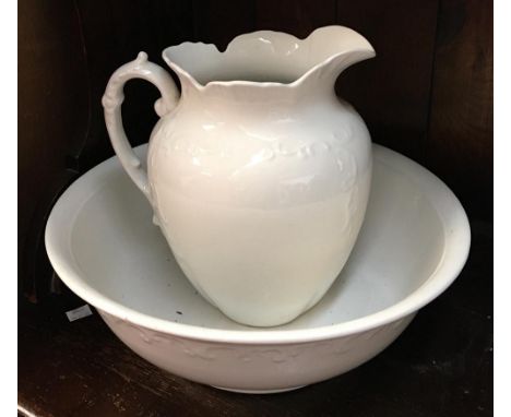 A white ceramic washbowl and jug, marked J.H.W &amp; Sons Falcona ware, the bowl 39cmD 