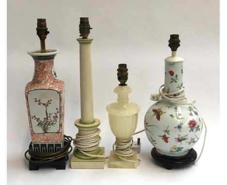 A lot of four table lamps: one hand painted in Oriental style with butterflies and flowers; one other similar; one onyx; and 