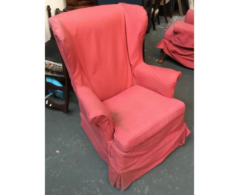 A pair of wingback armchairs, each with loose cover and cushion, on cabriole front legs