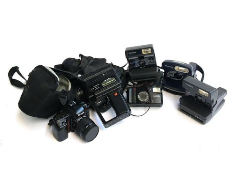 A mixed lot of photographic equipment to include Minolta XL-440 Sand; Polaroid 600; Polaroid 636; Polaroid 636 closeup; Nikon