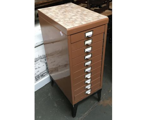 A vintage metal filing cabinet having ten drawers, 40x28x75cmH 