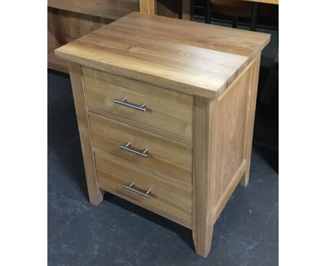 A light oak bedside table of three drawers, 51x40x61cmH 