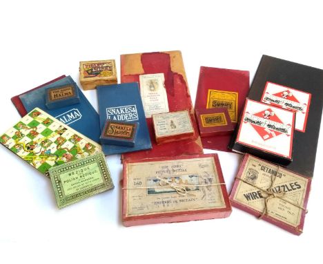 A mixed box of vintage board games, to include Peter Rabbit's Race Game; Monopoly; Snakes &amp; Ladders; Halma; Sorry; Beziqu